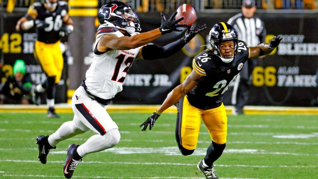 Christian Kirk running with the football during an NFL game