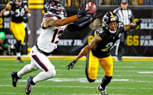 Christian Kirk running with the football during an NFL game