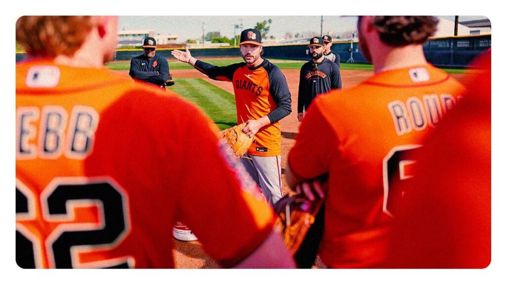 San Francisco Giants manager Tony Vitello looking intensely from the dugout in his baseball cap