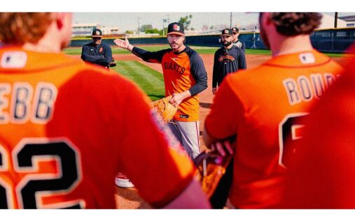 San Francisco Giants manager Tony Vitello looking intensely from the dugout in his baseball cap