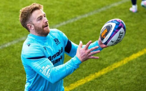 Scotland winger Kyle Steyn running with the ball during a training session ahead of the France match