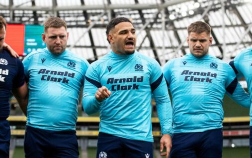 Scotland rugby players celebrating on the pitch during the Six Nations championship
