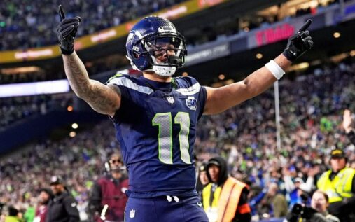 Jaxon Smith-Njigba running a route in a Seattle Seahawks uniform during an NFL game