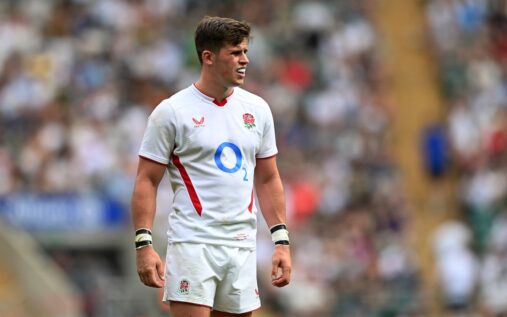 Seb Atkinson running with the ball during an England rugby training session