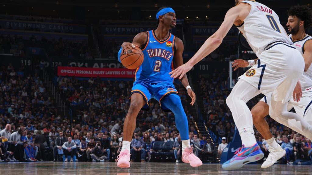 Oklahoma City Thunder guard Shai Gilgeous-Alexander dribbling the basketball during an NBA game