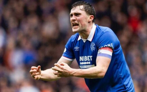 Rangers defender John Souttar gesturing to teammates during a match at Ibrox