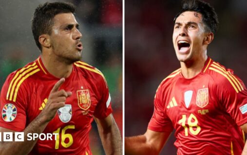 Spain manager Luis de la Fuente watching holding midfielders Rodri and Martin Zubimendi