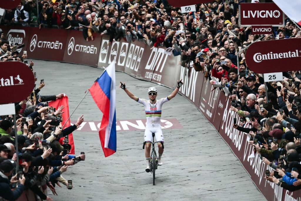 Tadej Pogacar bowing to the crowd in Siena after winning Strade Bianche