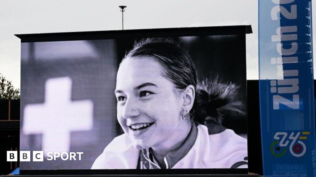 Swiss cyclist Muriel Furrer competing in a road race wearing her national team kit