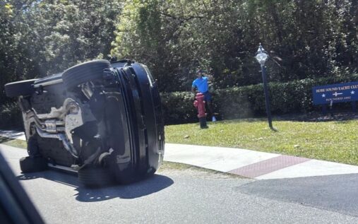 Tiger Woods looking serious while speaking to the media at a press conference