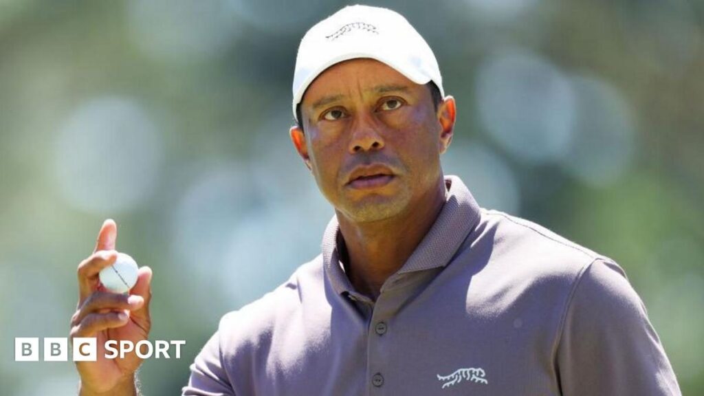 Tiger Woods looking serious while attending a PGA Tour golf event