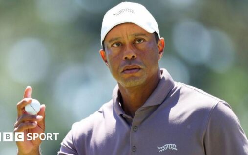 Tiger Woods looking serious while attending a PGA Tour golf event