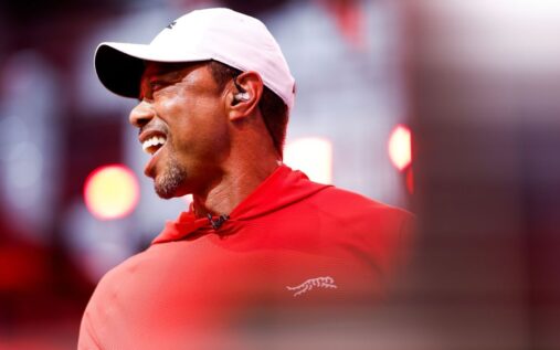 Tiger Woods looking thoughtful while speaking to reporters at a press conference