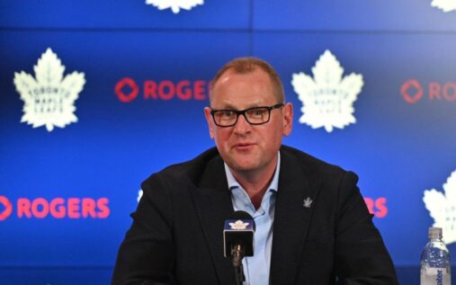 Former Toronto Maple Leafs general manager Brad Treliving looking on during a game