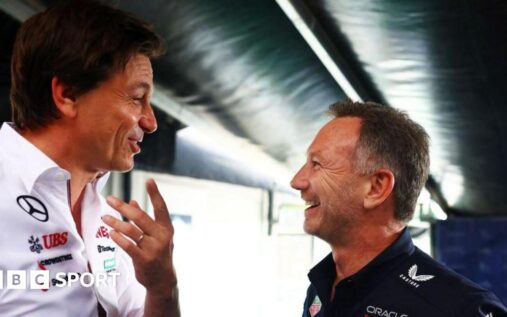 Toto Wolff and Christian Horner standing in the Formula 1 paddock