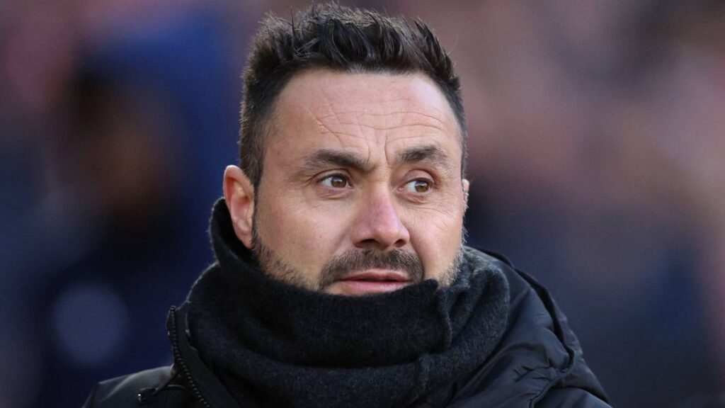 Robbie Keane looking thoughtful on the touchline while managing Ferencvaros