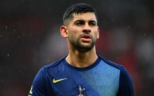 Cristian Romero wearing the Tottenham Hotspur captain's armband looking frustrated on the pitch