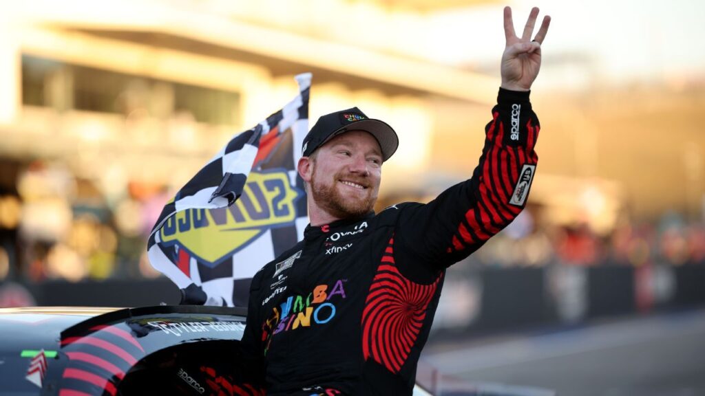Tyler Reddick's 23XI Racing Toyota leads the field at the Circuit of the Americas