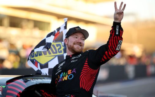 Tyler Reddick's 23XI Racing Toyota leads the field at the Circuit of the Americas
