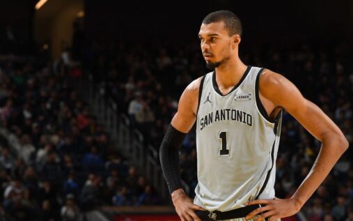 Victor Wembanyama of the San Antonio Spurs handling the basketball during an NBA game