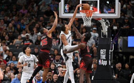Victor Wembanyama completing a one-handed dunk for the San Antonio Spurs