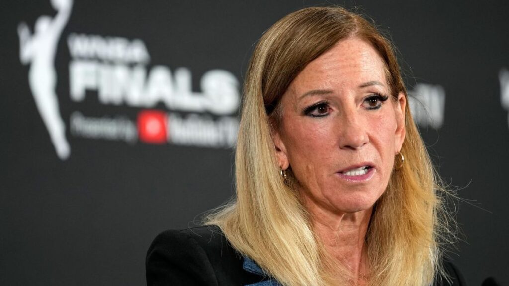 WNBA athletes competing on the basketball court during a professional match
