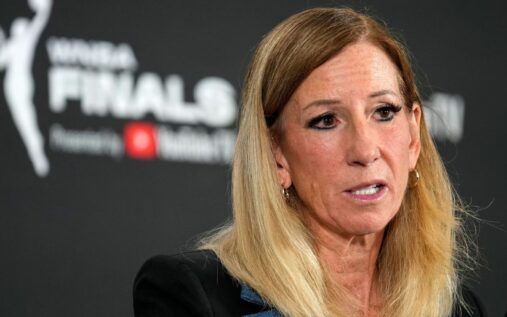 WNBA athletes competing on the basketball court during a professional match