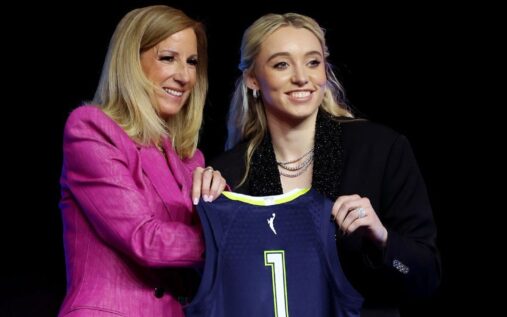 WNBA players competing on court during a professional women's basketball match