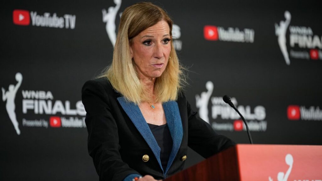 WNBA Commissioner Cathy Engelbert speaking at a press conference