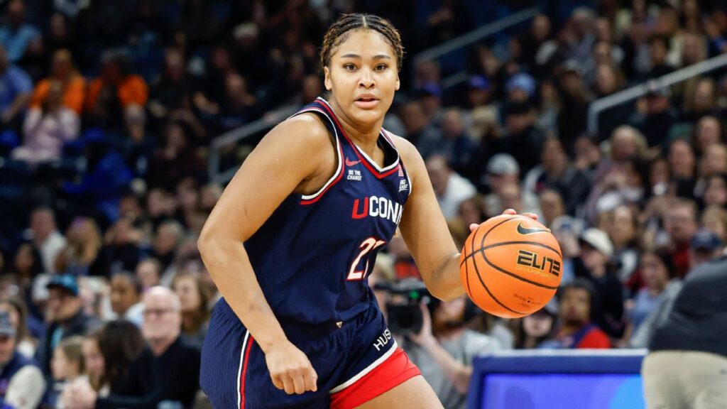 UConn's Sarah Strong dribbling the ball up the court during a Big East conference game