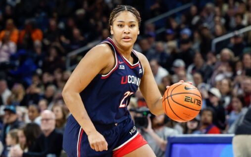UConn's Sarah Strong dribbling the ball up the court during a Big East conference game