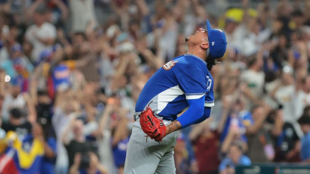 Team Venezuela baseball players celebrating their victory over the United States in the World Baseball Classic final