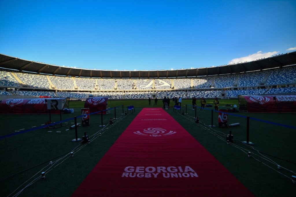 Georgia rugby players lining up on the pitch before a match at the 2023 Rugby World Cup in France