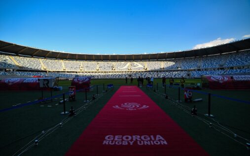 Georgia rugby players lining up on the pitch before a match at the 2023 Rugby World Cup in France