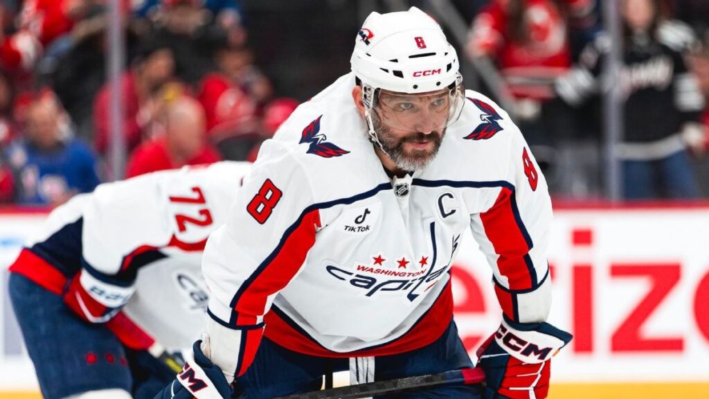 Alex Ovechkin in his Washington Capitals uniform looking on during an NHL game