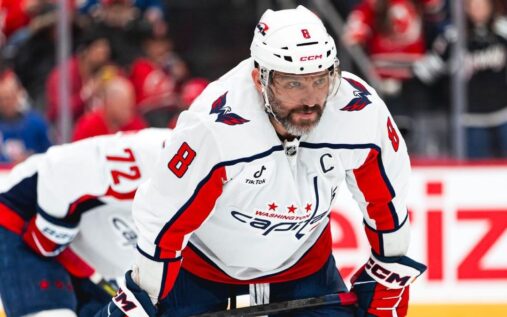 Alex Ovechkin in his Washington Capitals uniform looking on during an NHL game