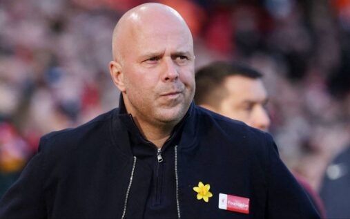 Liverpool goalkeeper Alisson Becker looking thoughtful on the pitch