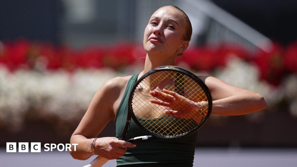 Anastasia Potapova celebrating on court after her historic quarter-final victory at the Madrid Open