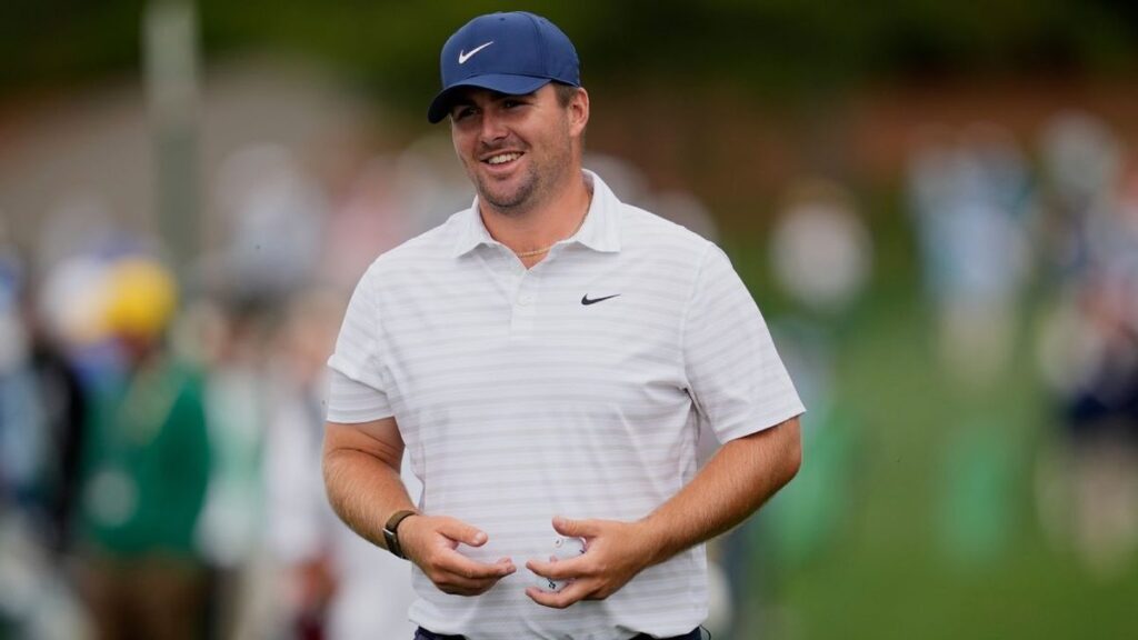 Golfer Andrew Novak lining up a putt on the green during a PGA Tour tournament
