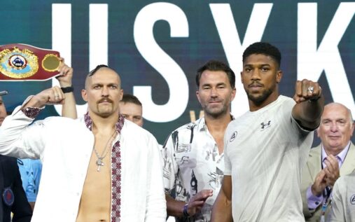 Anthony Joshua and Oleksandr Usyk training together in a boxing gym