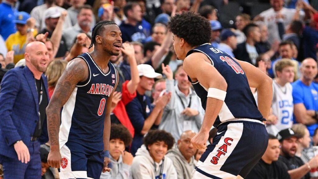 Arizona Wildcats basketball players celebrating on the court during the 2026 NCAA tournament