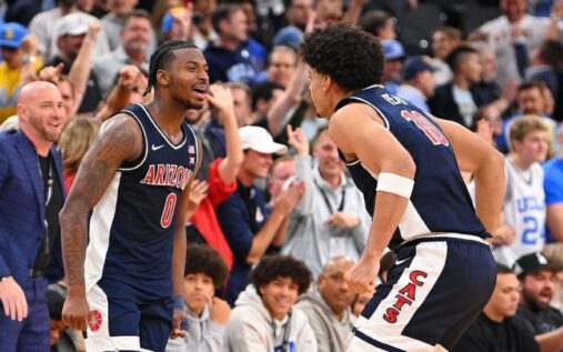 Arizona Wildcats basketball players celebrating on the court during the 2026 NCAA tournament