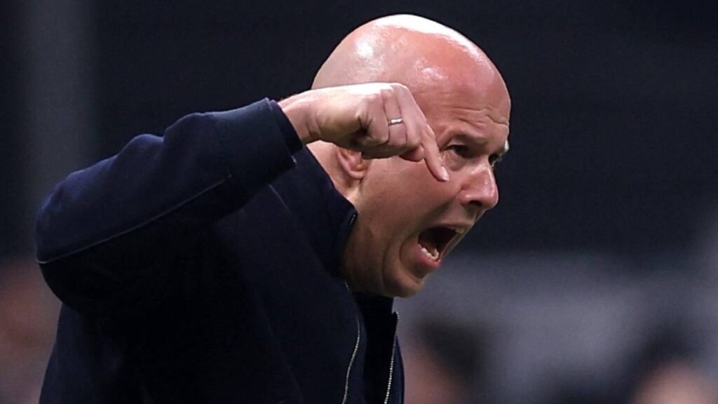 Dejected Liverpool manager Arne Slot watching his team from the Anfield touchline