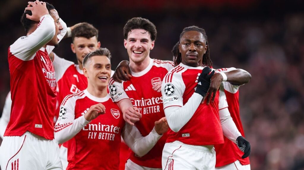Arsenal players celebrating a vital goal in the Champions League quarter-finals