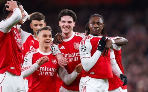 Arsenal players celebrating a vital goal in the Champions League quarter-finals