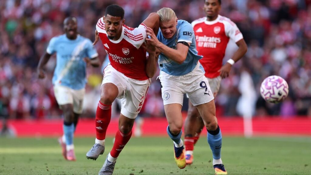 Mikel Arteta and Arsenal players looking focused during a Premier League match