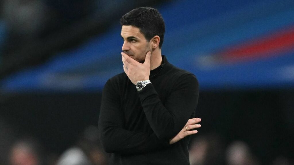 Arsenal manager Mikel Arteta looking focused on the touchline during a Champions League match