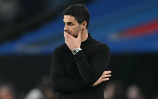 Arsenal manager Mikel Arteta looking focused on the touchline during a Champions League match