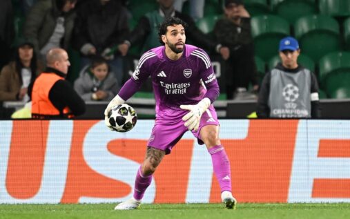 Arsenal goalkeeper David Raya making a vital save during a Champions League match