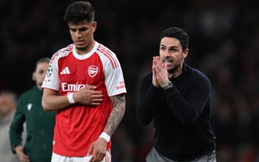 Arsenal manager Mikel Arteta looking concerned on the touchline during a Champions League fixture.